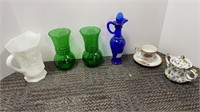 (2) green glass vases, (1) milk glass pitcher,