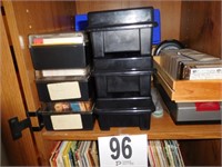 SHELF OF ASSORTED CASSETTE TAPES