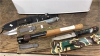 Two diving knives with sheaths, folding shovel,