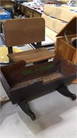Old doll baby cradle and a doll size school desk
