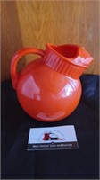 Vintage orange glass pitcher