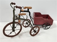 Small rustic metal tricycle pair