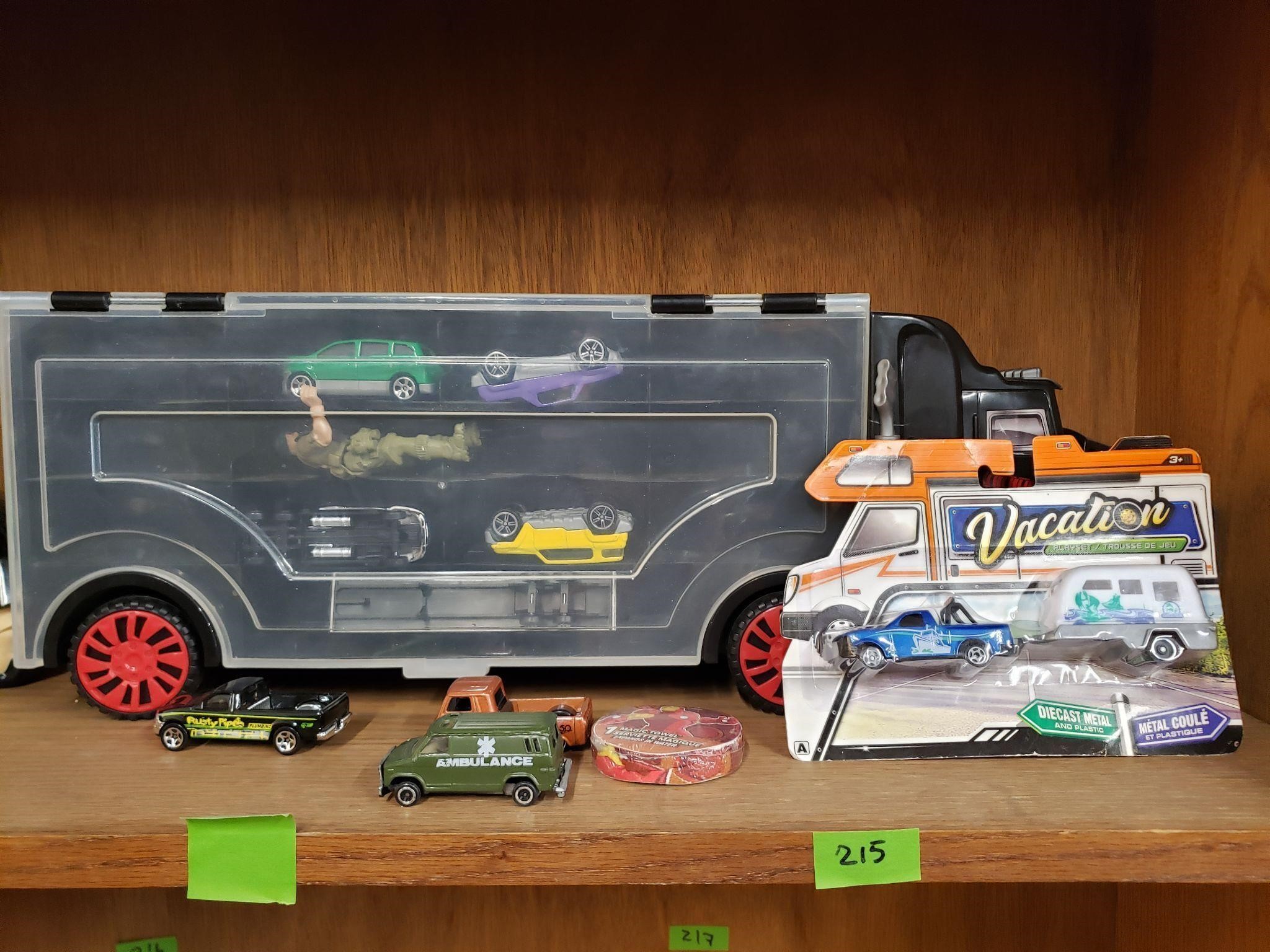 Assorted Toy Cars and Deisel Car Carrier