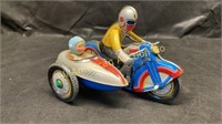 Motorcycle with side car, tin litho wind up, works