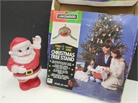 Vintage Squeeky Santa Works & Christmas Tree Stan