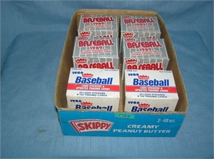 Box full of Fleer factory sealed updated traded ca