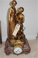 M Bouval Bronze statue with marble clock base