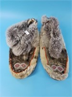 Handmade pair of sealskin mukluks with hand-be