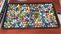 Vintage machine made marbles. Containers not
