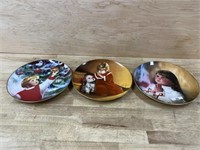 3- Collector plates with Christmas scenes