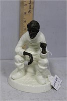 Minton "Travellers tales" seated figure