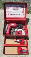 Milwaukee 12 volt drill/driver kit in metal case.