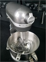Kitchen Aid professional mixer with attachments.