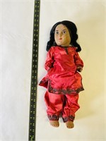 Indian Porcelain Doll in red silk outfit