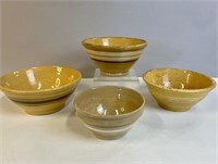 FOUR VINTAGE AND ANTIQUE YELLOW WARE BOWLS
