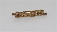 Vintage 15ct yellow gold and diamond brooch