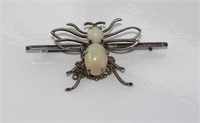 Silver and opal insect brooch