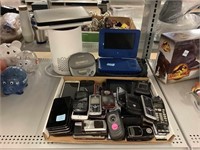 Assorted phones, and other electronics.