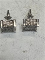 Sterling silver and diamond earrings.