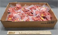 Flat of Oscar Mayer Weiner Mobile Whistles