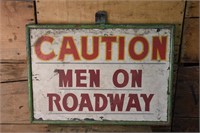 Wooden Caution Man on Roadway Sign