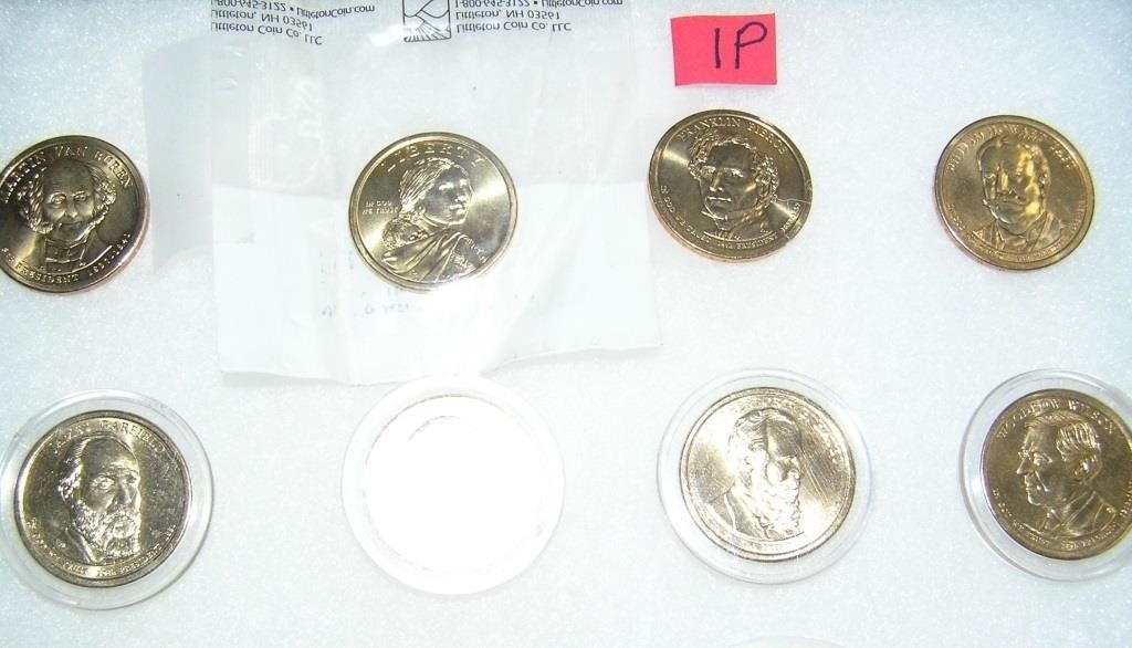 Group of uncirculated Golden Dollar coins