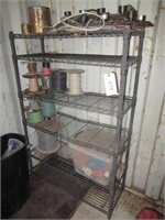 Metal storage shelf with contents