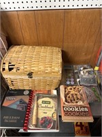, wicker basket with assorted cookbooks, cassette