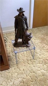 Cowboy statue with stand