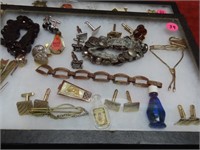 Showcase of Jewelry & perfume bottles.