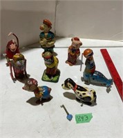 Assorted vintage wind up toys
