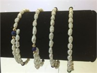 4- sets of sea pearls w/ 14k gold beads