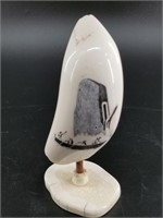 D.N.  sperm whale tooth with scrimshaw of
