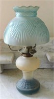 Pair of antique kerosene lamps w/ embossed glass