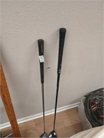 2 golf clubs