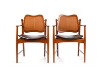 Eight teak mid century modern dining chairs