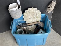 Blue tote full of garden stones, misc