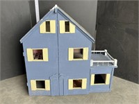 Blue wood doll house