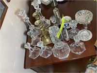 Large group of candle sticks mostly glass