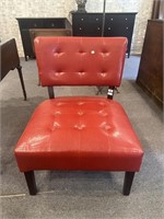 Red tufted chair