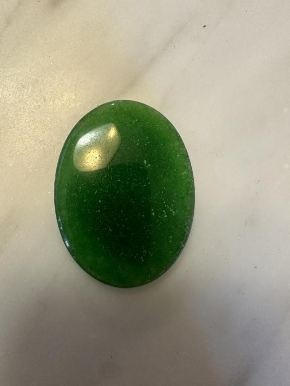 CHINESE OVAL POLISHED JADE STONE NOTE