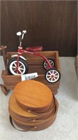 Miniature radio Flyer tricycle, wooden wagon, and