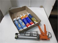 Caulk gun and liquid nail caulk