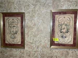 Pair of gold colored framed prints, appeared to be