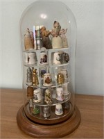 Thimble collection in glass dome