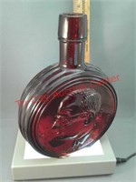 Red glass Wheaton presidential bottle marked with