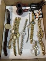 Women’s watches, pipes and halloween necklace