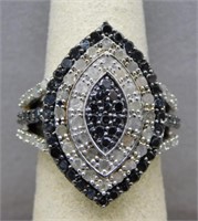 Sterling and diamond ring, size 7. Weight 8.60