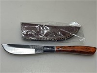 NIB Sawmill skinner fixed blade knife.
