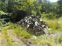Large pile of split firewood